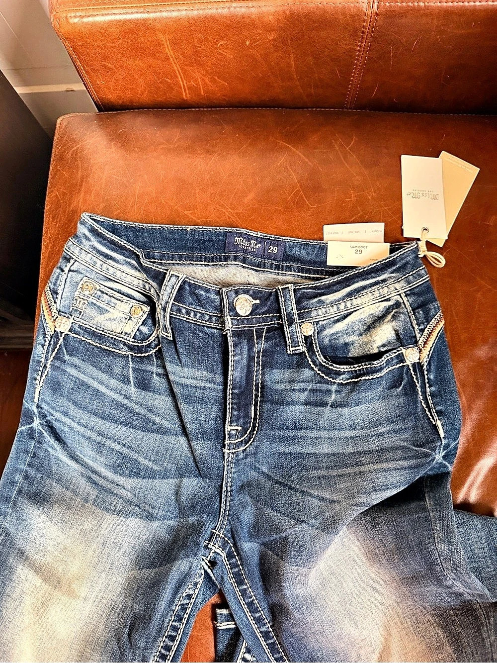 Miss Me Mid-Rise Slim Boot Jeans with Embroidered and Sequined Flap Pockets